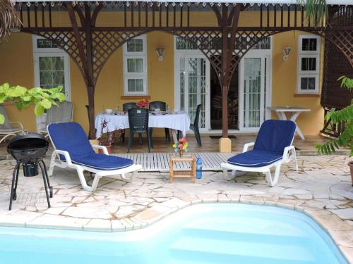 Πισίνα στο ή κοντά στο Charming villa in Blue Bay with private pool