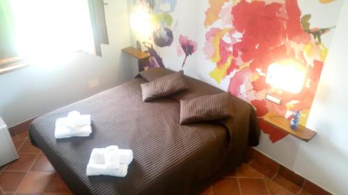 Tempat tidur dalam kamar di 8 bedrooms villa with private pool enclosed garden and wifi at Segni