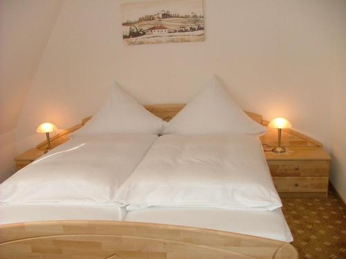 Postel nebo postele na pokoji v ubytování Hotel Thule