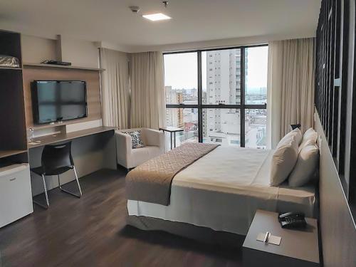 Hotel 7 Itajaí房間的床
