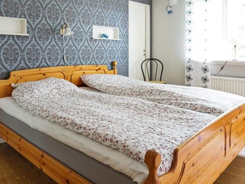 Postel nebo postele na pokoji v ubytování 6 person holiday home in ED