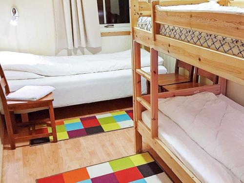 Ένα ή περισσότερα κρεβάτια σε δωμάτιο στο 6 person holiday home in Hamnvik