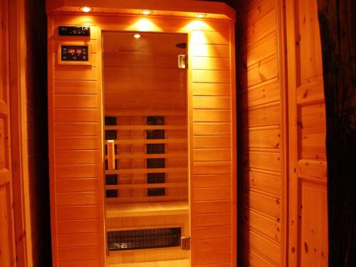 a walk in shower with a glass door in a room at 9 person holiday home in Utsira-By Traum in Utsira