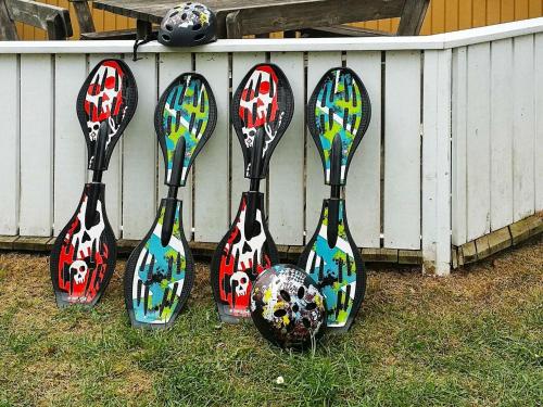 a group of four golf clubs with soccer balls on them at 10 person holiday home in V ggerl se in Marielyst