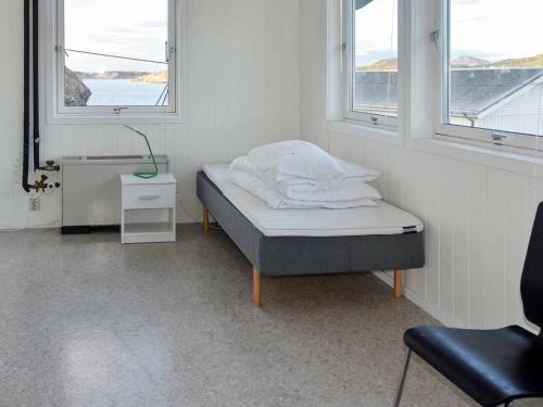 Postel nebo postele na pokoji v ubytování Holiday Home Steinvik II