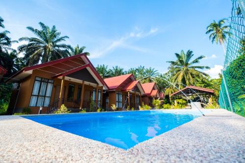 สระว่ายน้ำที่อยู่ใกล้ ๆ หรือใน Cinta Abadi Resort