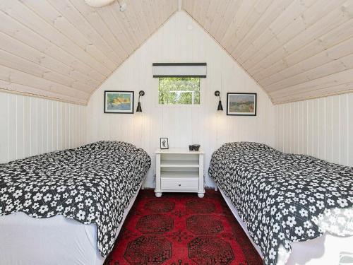 En eller flere senge i et værelse på 7 person holiday home in S by