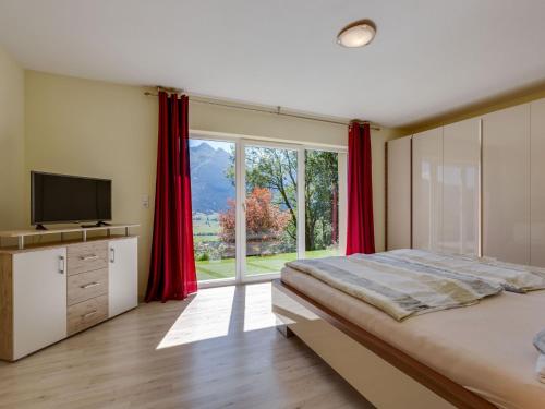 Ένα ή περισσότερα κρεβάτια σε δωμάτιο στο Bright flat close to the ski area