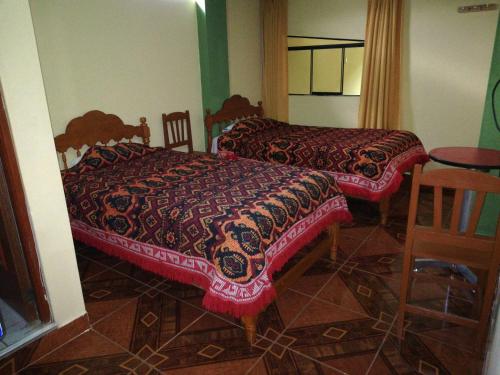 Postel nebo postele na pokoji v ubytování Artesonraju Hostel Huaraz