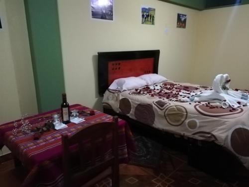 Postel nebo postele na pokoji v ubytování Artesonraju Hostel Huaraz