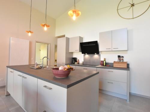 A kitchen or kitchenette at Tasteful holiday home in Sijsele Brugge with garden