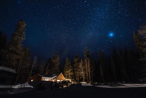 a cabin under a starry sky at night at Beyul Retreat in Meredith