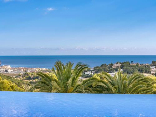 a view of the ocean from a swimming pool at Villa in Moraira with Pool near Beach in Moraira