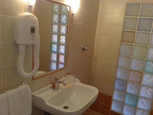 Ett badrum på Locanda Il Gallo
