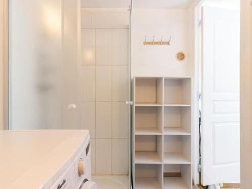 a bathroom with a shower and a white sink at Apartment in Gargas near Route des Ocres in Gargas