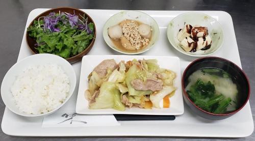 a tray of food with rice and other bowls of food at VistaMare in Kanoya