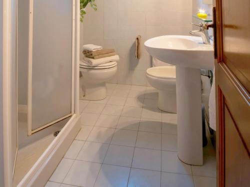 a bathroom with a toilet and a sink at Holiday home in Dicomano FI in Dicomano