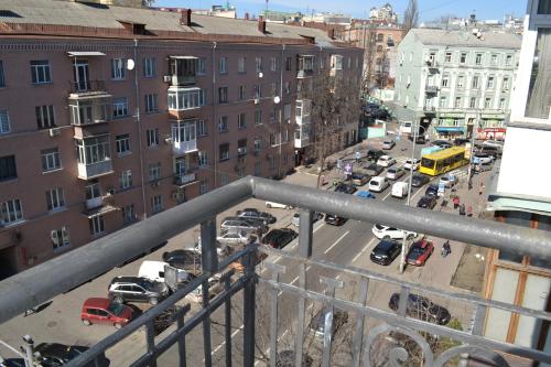a view of a busy city street with parked cars at Heart Kyiv Apart-Hotel in Kyiv