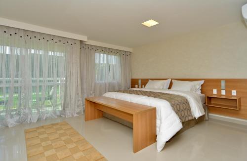 Ένα ή περισσότερα κρεβάτια σε δωμάτιο στο Sun Residence