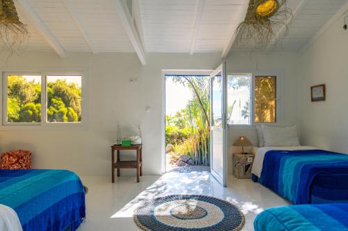 Una cama o camas en una habitación de Dakhla Attitude