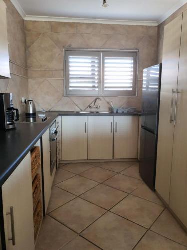 Kuchyň nebo kuchyňský kout v ubytování Albatross Guesthouse