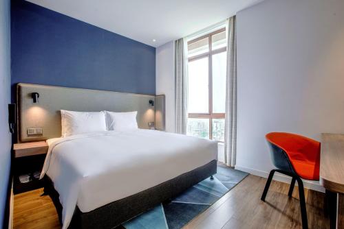 Katil atau katil-katil dalam bilik di Holiday Inn Express Zhangjiagang Free Trade Zone by IHG