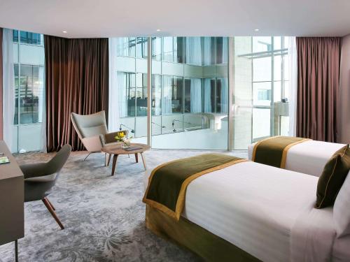 Postel nebo postele na pokoji v ubytování Ibis Styles Dubai Jumeira