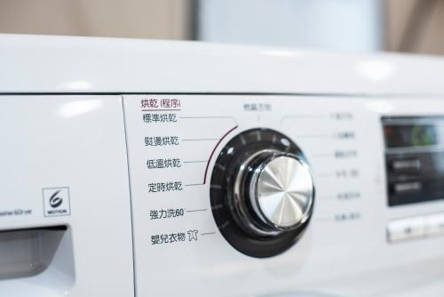 a close up of a washing machine at XinsheHotel - Chungli in Zhongli