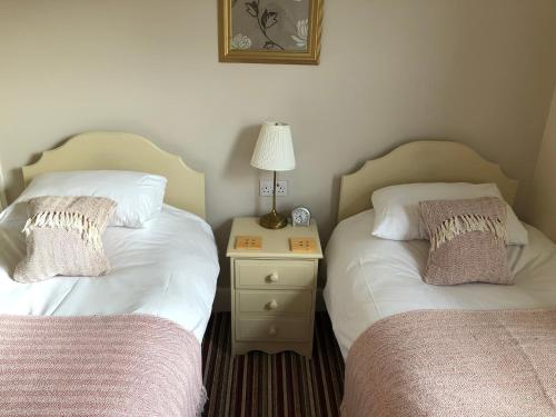 Letto o letti in una camera di Devonshire House