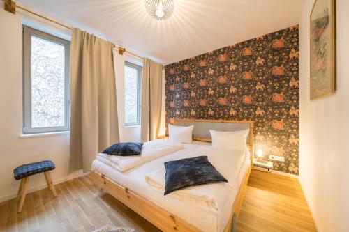 Кровать или кровати в номере Design Apartments - "Am Weinberg"