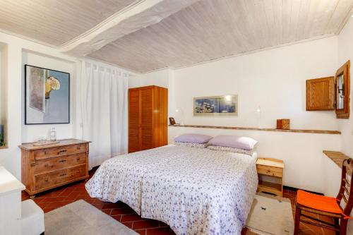 Ένα ή περισσότερα κρεβάτια σε δωμάτιο στο Agriturismo Apparita