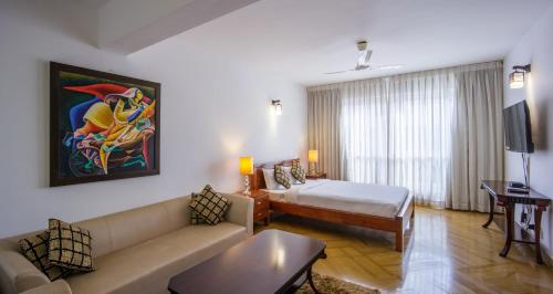 Katil atau katil-katil dalam bilik di Quill Residence - Candolim,Goa