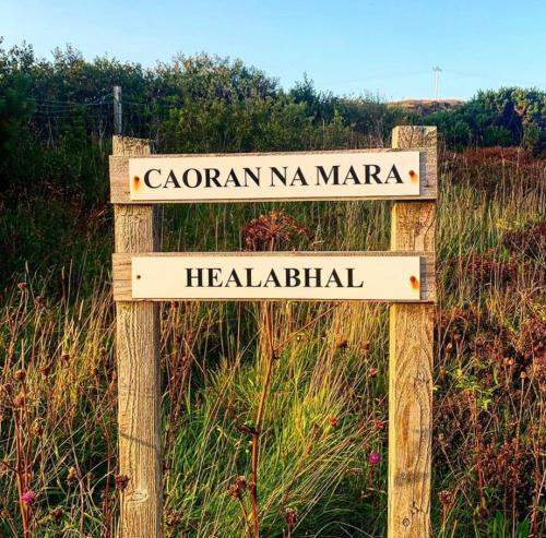 a sign for cordonan na mara and haliblical at Head In The Skye - Healabhal Cottage in Ose