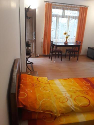 Postel nebo postele na pokoji v ubytování PENSIUNEA DODO