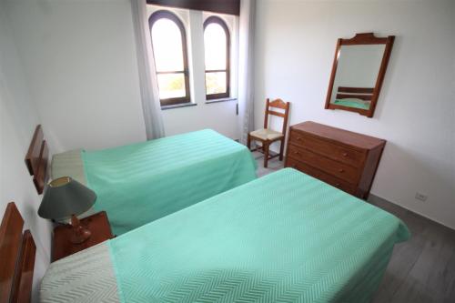 Katil atau katil-katil dalam bilik di T2 Clube Alvor Férias