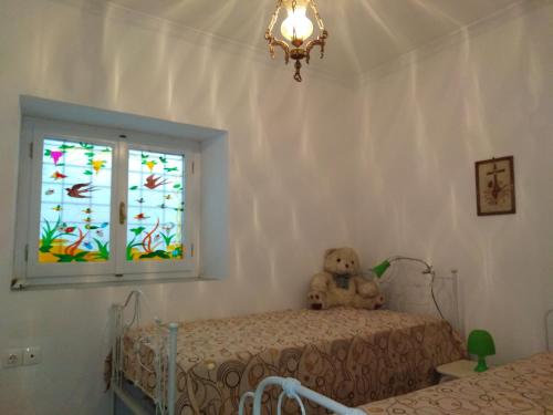 Posteľ alebo postele v izbe v ubytovaní Epavli Sofia' s two Apartments in Horto, 30m from the sea