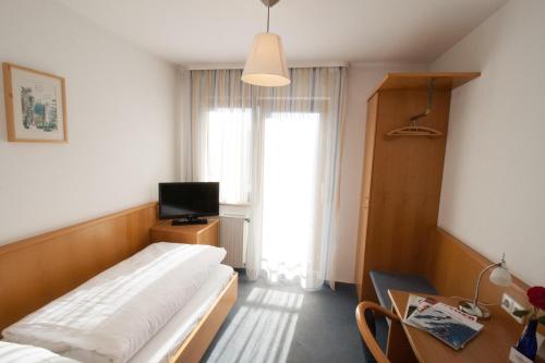 Ένα ή περισσότερα κρεβάτια σε δωμάτιο στο Hotel Krone Straßdorf