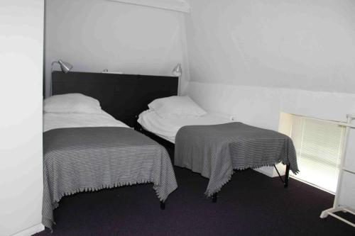 Posteľ alebo postele v izbe v ubytovaní Ustawi