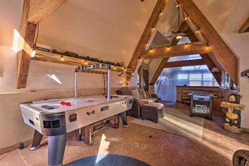 a room with a ping pong table in a room at Big Family Fun! Mtn Cabin Between Bryce and Zion in Long Valley Junction