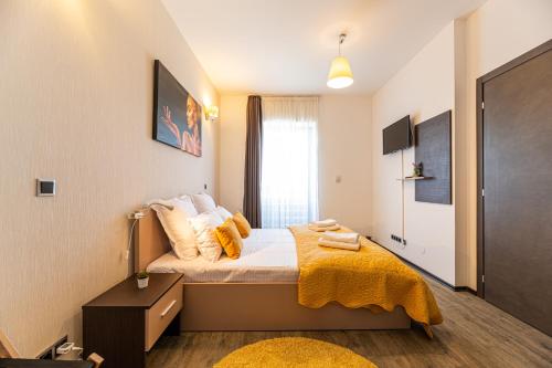 Ένα ή περισσότερα κρεβάτια σε δωμάτιο στο Forest corner in silver mountain of poiana brasov