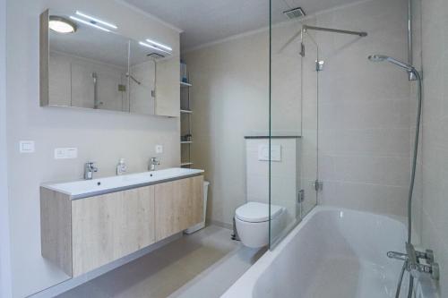 Ένα μπάνιο στο Vakantiewoning Tilia