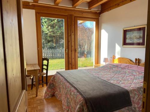 Postel nebo postele na pokoji v ubytování Eco Chalet Nonno Silvano