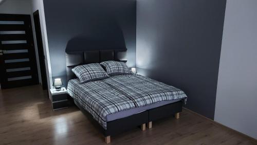 Cama ou camas em um quarto em Baltic House Ustka