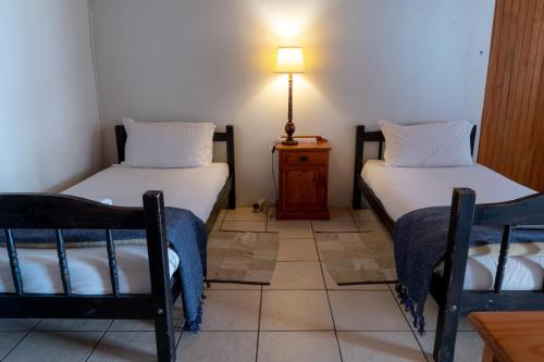 Katil atau katil-katil dalam bilik di Selborne Bed and Breakfast