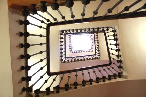 a stairway with a picture of a person on it at The River Hostel in Valencia
