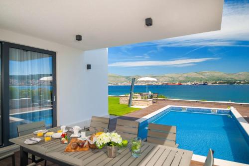 Luxury beachfront Villa Trogir 1 on Čiovo with 2 pools