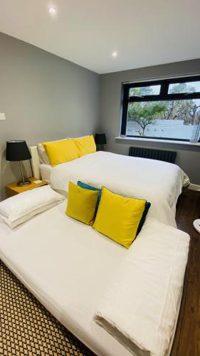 Ένα ή περισσότερα κρεβάτια σε δωμάτιο στο The Annexe