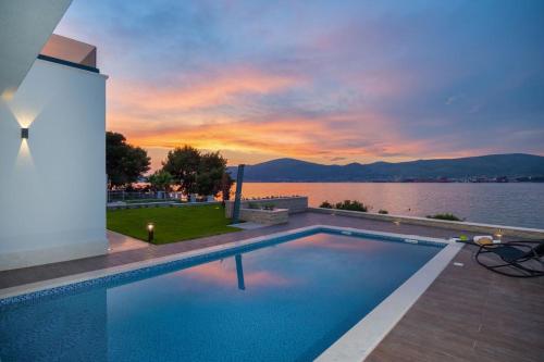 Luxury beachfront Villa Trogir 1 on Čiovo with 2 pools