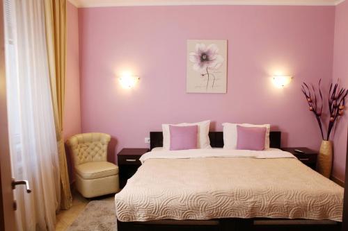 Ένα ή περισσότερα κρεβάτια σε δωμάτιο στο Apartments Paradisos