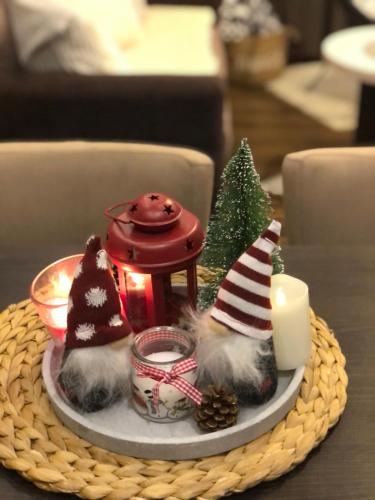 a tray with christmas decorations on a table at Silver Mountain Milmari in Kopaonik